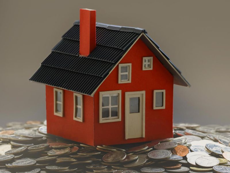 Real estate and property investment concept : small house model